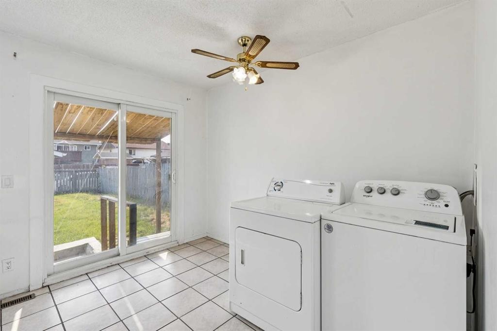 104 Falmere Way Ne, Calgary, AB - Indoor Photo Showing Laundry Room