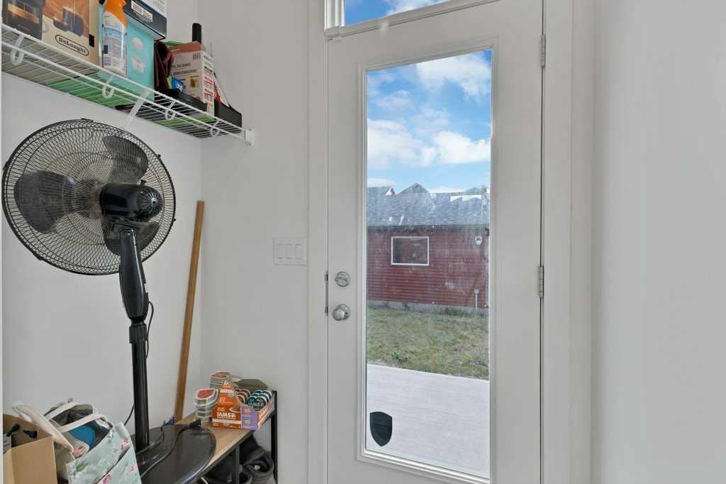 25 Savanna Manor Ne, Calgary, AB - Indoor Photo Showing Laundry Room