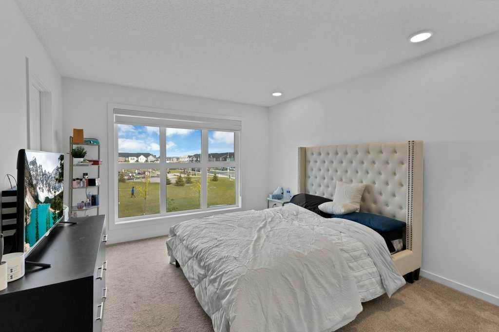 25 Savanna Manor Ne, Calgary, AB - Indoor Photo Showing Bedroom