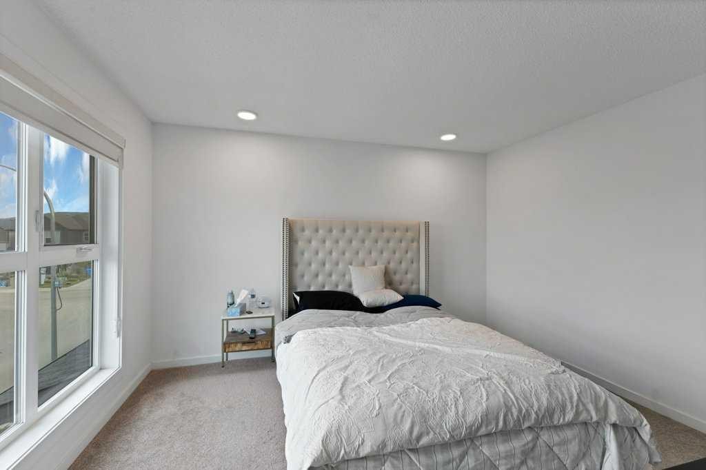 25 Savanna Manor Ne, Calgary, AB - Indoor Photo Showing Bedroom