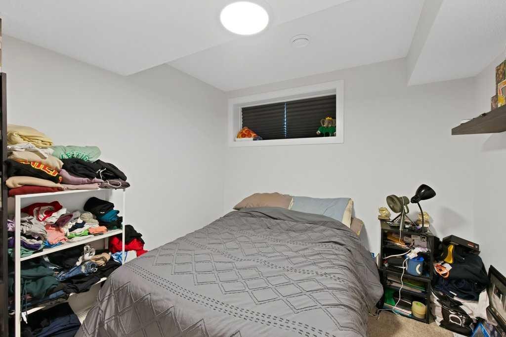 25 Savanna Manor Ne, Calgary, AB - Indoor Photo Showing Bedroom