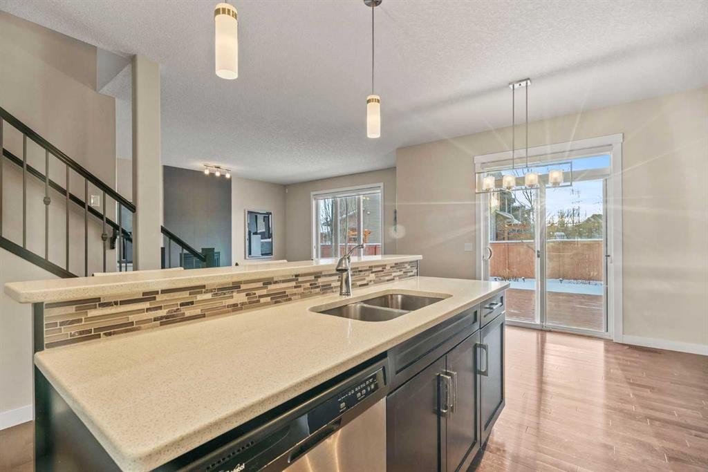2306 Bayside Circle Sw, Airdrie, AB - Indoor Photo Showing Kitchen With Double Sink