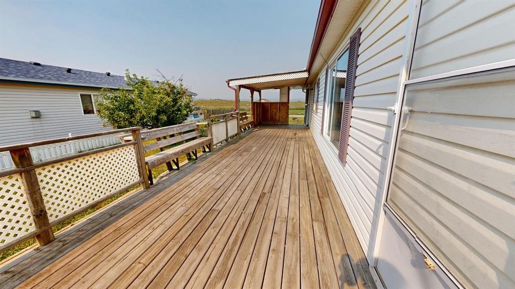 1905 29 Avenue, Nanton, AB - Outdoor With Deck Patio Veranda With Exterior