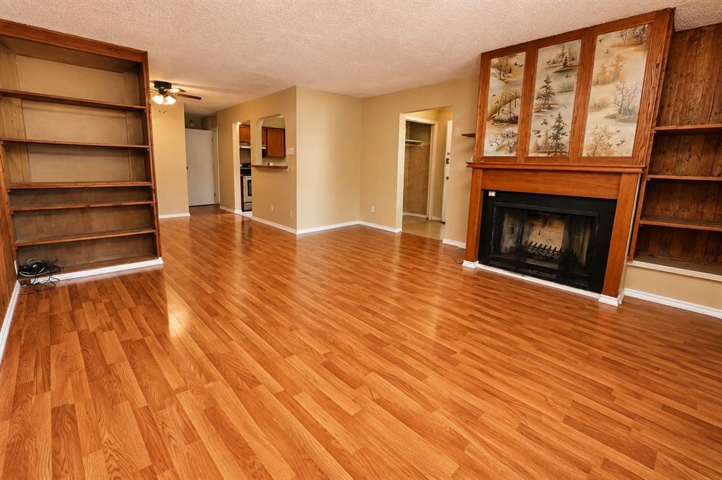 7 Dovercliffe Way Se, Calgary, AB - Indoor Photo Showing Living Room With Fireplace