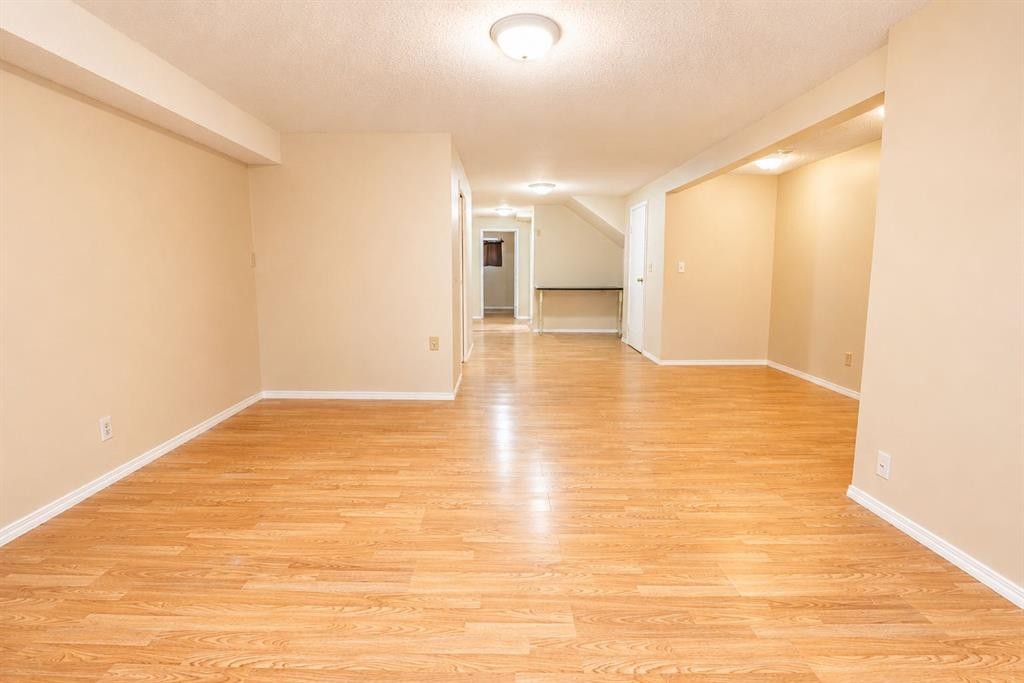 7 Dovercliffe Way Se, Calgary, AB - Indoor Photo Showing Other Room