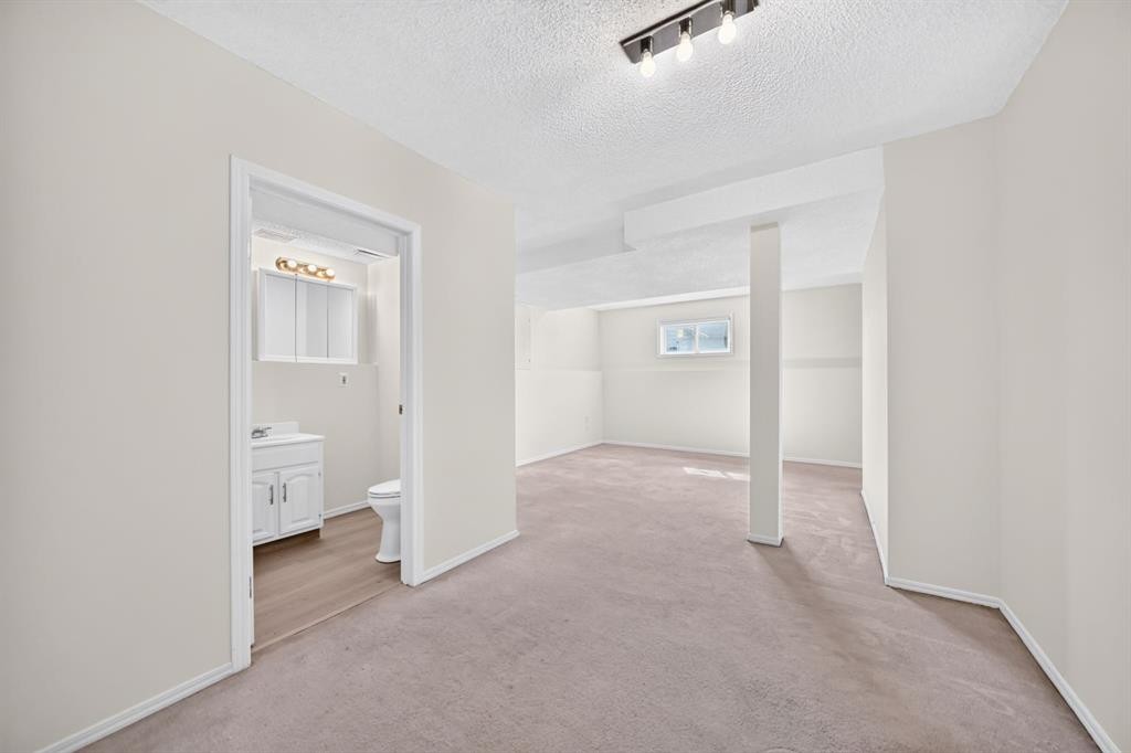 143 Applewood Drive Se, Calgary, AB - Indoor Photo Showing Other Room