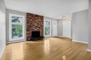 1307 56 Avenue Nw, Calgary, AB  - Indoor Photo Showing Living Room With Fireplace 
