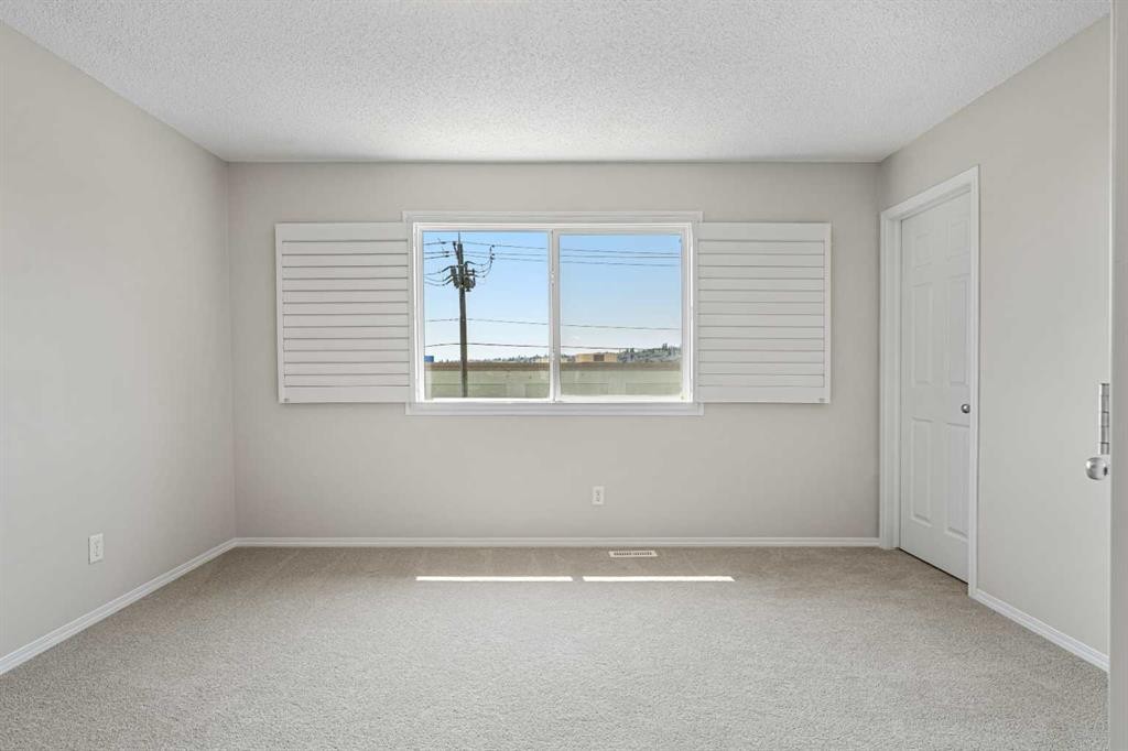 51 Covehaven Mews Ne, Calgary, AB - Indoor Photo Showing Other Room