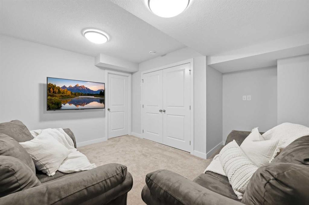 535 Canals Crossing Sw, Airdrie, AB - Indoor Photo Showing Living Room