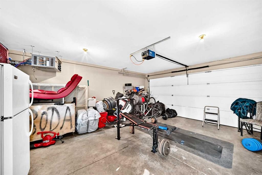7616 23 Street Se, Calgary, AB - Indoor Photo Showing Garage