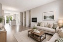 209 Copperpond Row Se, Calgary, AB  - Indoor Photo Showing Living Room 