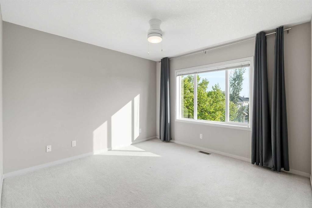 209 Copperpond Row Se, Calgary, AB - Indoor Photo Showing Other Room