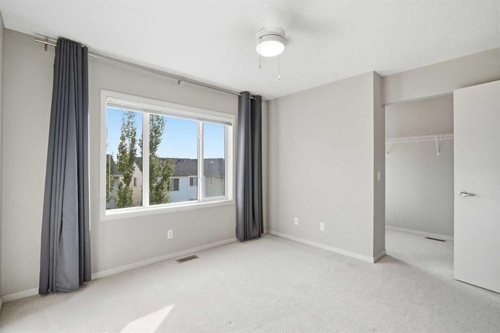 209 Copperpond Row Se, Calgary, AB - Indoor Photo Showing Other Room