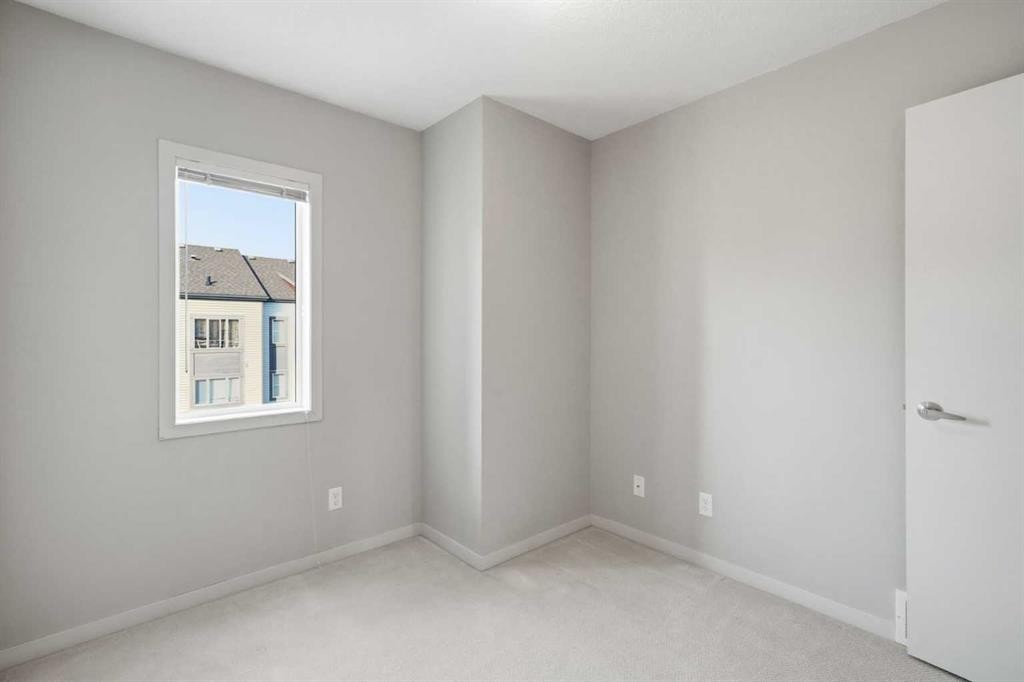 209 Copperpond Row Se, Calgary, AB - Indoor Photo Showing Other Room