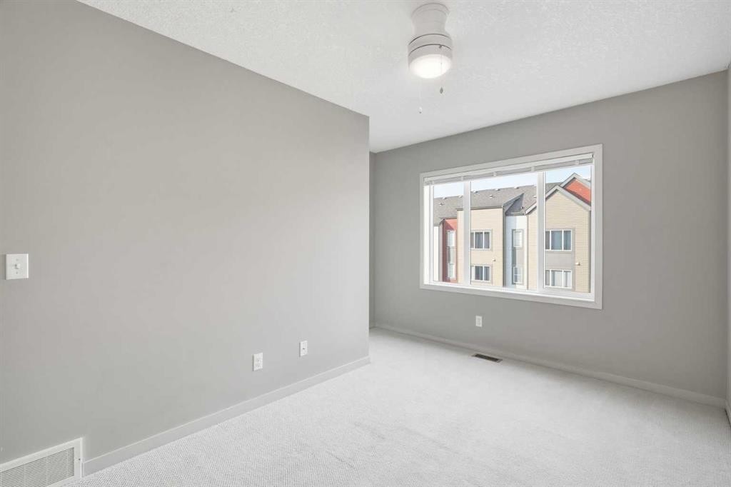 209 Copperpond Row Se, Calgary, AB - Indoor Photo Showing Other Room