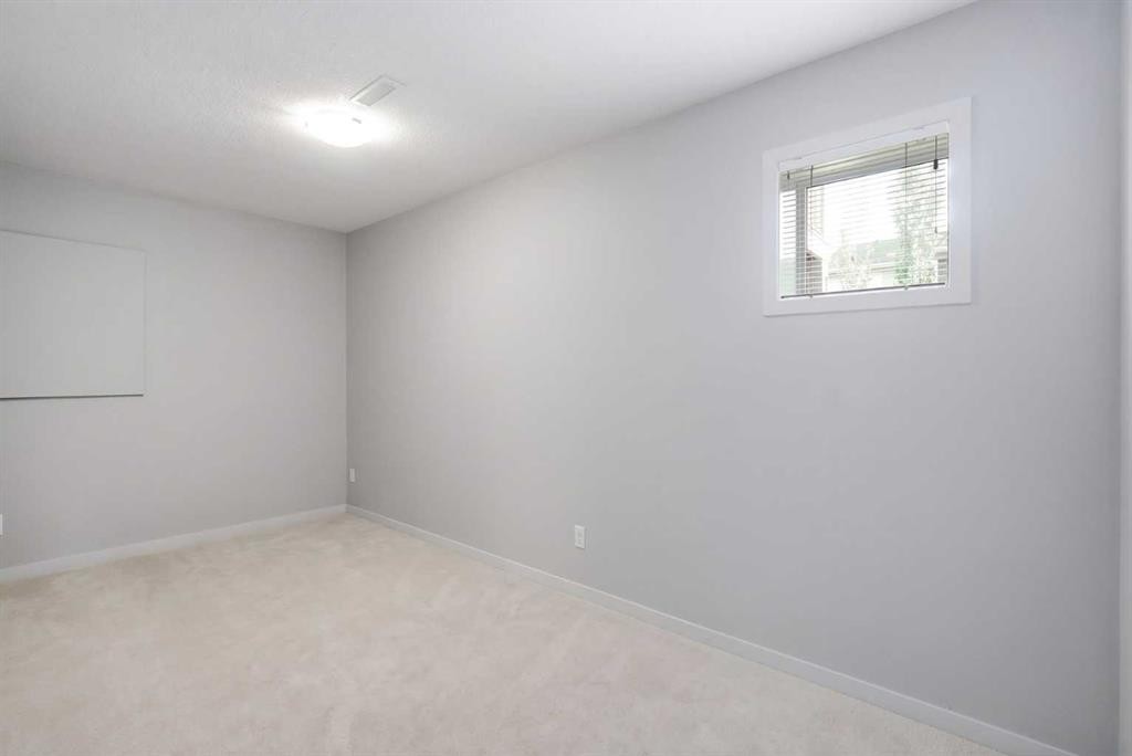 209 Copperpond Row Se, Calgary, AB - Indoor Photo Showing Other Room