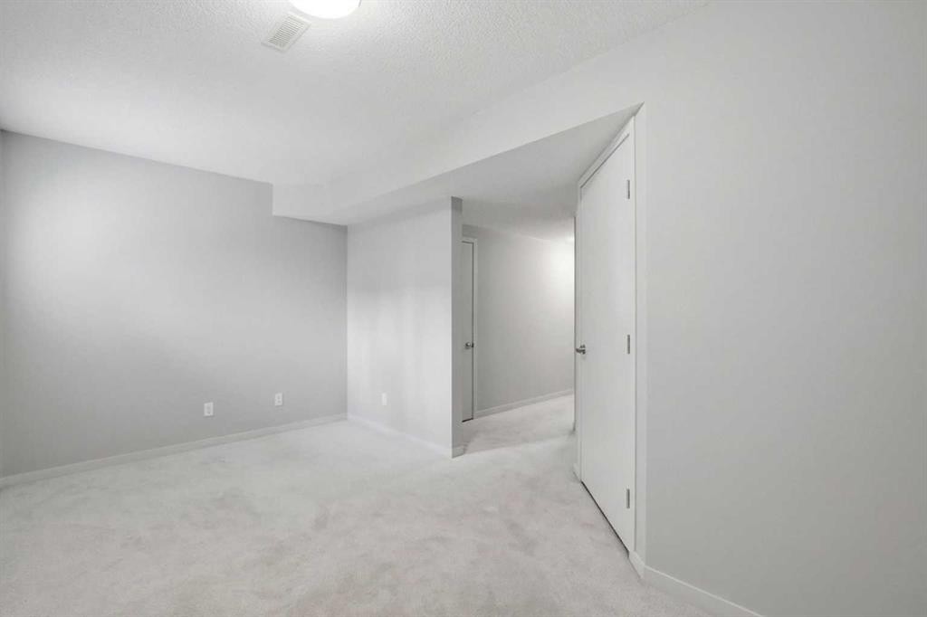 209 Copperpond Row Se, Calgary, AB - Indoor Photo Showing Other Room
