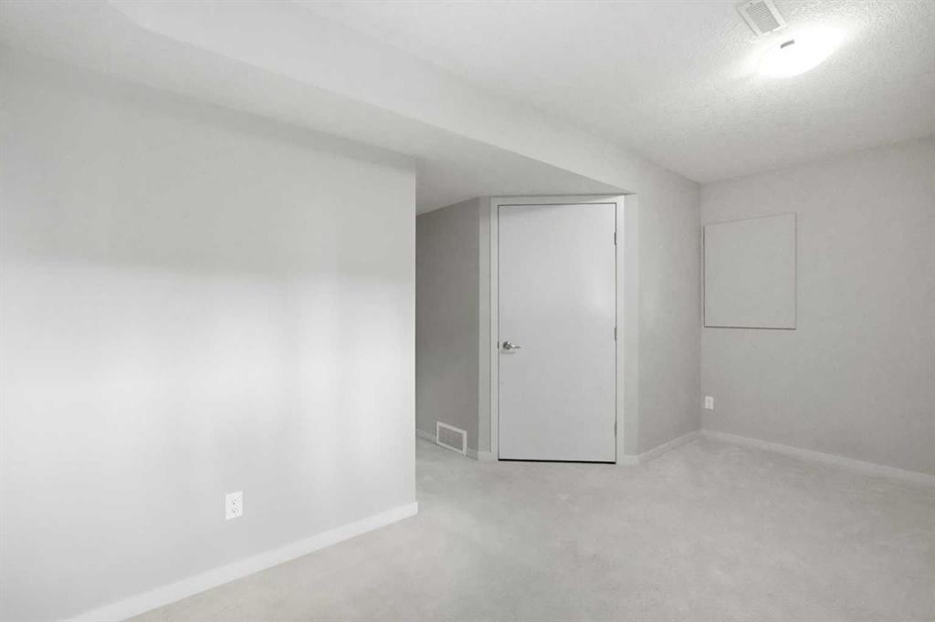 209 Copperpond Row Se, Calgary, AB - Indoor Photo Showing Other Room