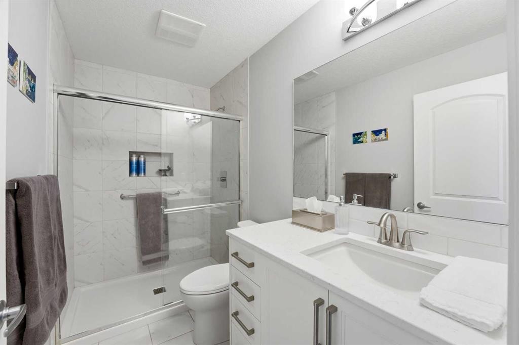 212-4150 Seton Drive Sw, Calgary, AB - Indoor Photo Showing Bathroom