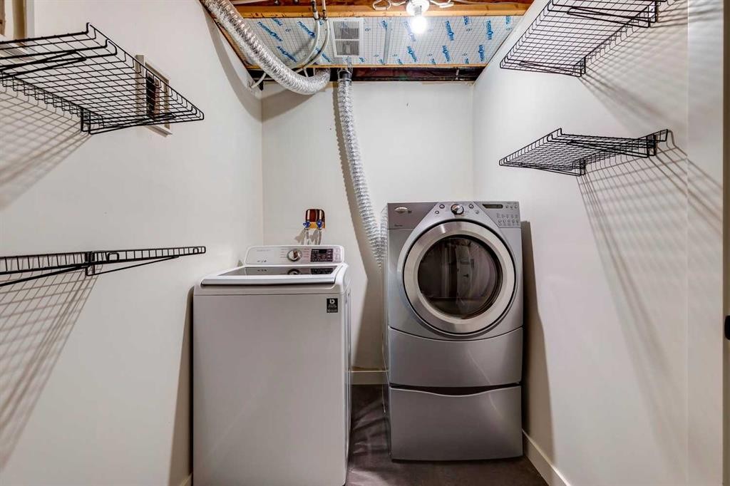 16 Simcrest Point Sw, Calgary, AB - Indoor Photo Showing Laundry Room