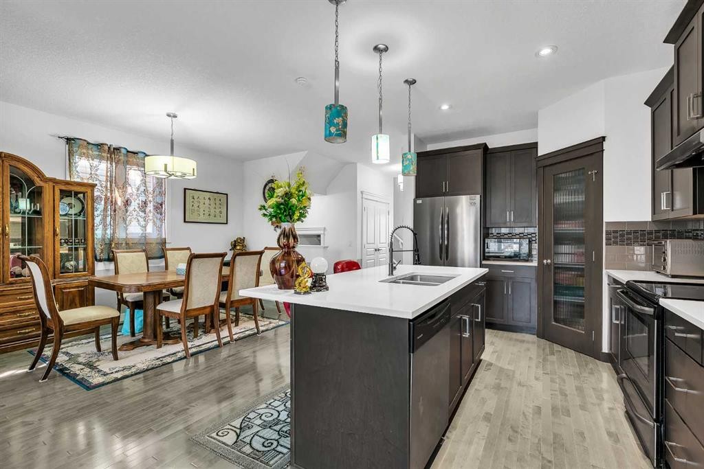 154 Redstone Common Ne, Calgary, AB - Indoor Photo Showing Kitchen With Stainless Steel Kitchen With Upgraded Kitchen