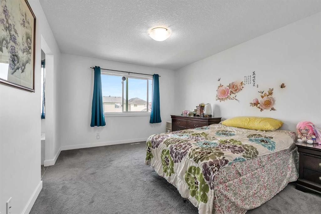 154 Redstone Common Ne, Calgary, AB - Indoor Photo Showing Bedroom