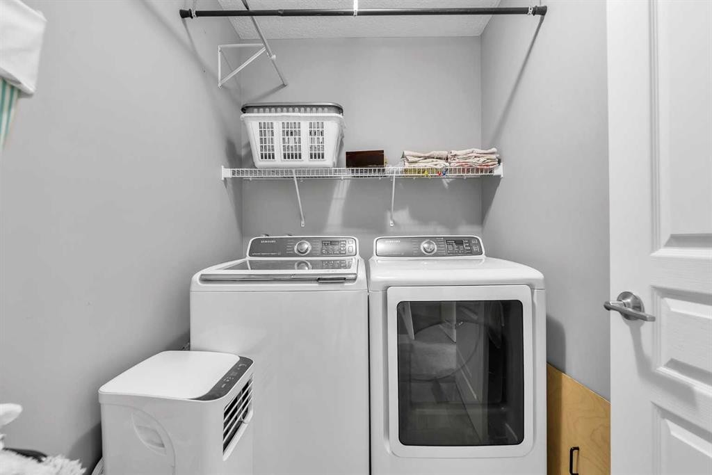 154 Redstone Common Ne, Calgary, AB - Indoor Photo Showing Laundry Room