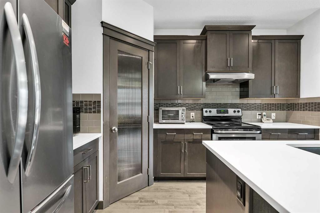 154 Redstone Common Ne, Calgary, AB - Indoor Photo Showing Kitchen With Stainless Steel Kitchen With Upgraded Kitchen