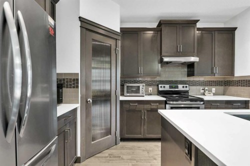 154 Redstone Common Ne, Calgary, AB - Indoor Photo Showing Kitchen With Stainless Steel Kitchen With Upgraded Kitchen