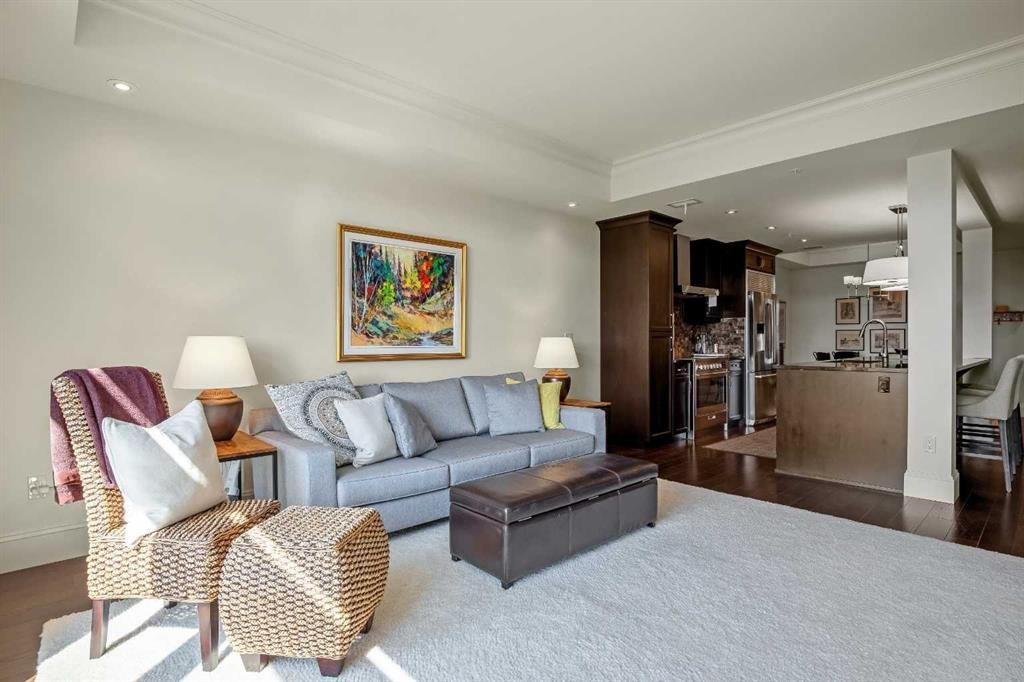 401-131 Quarry Way Se, Calgary, AB - Indoor Photo Showing Living Room