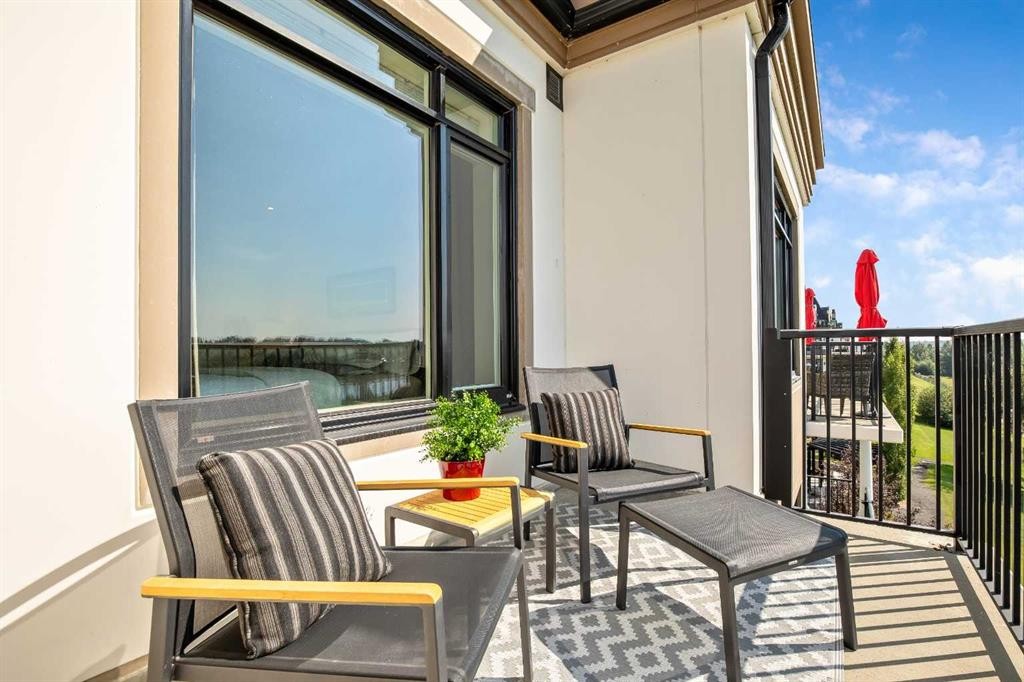 401-131 Quarry Way Se, Calgary, AB - Outdoor With Deck Patio Veranda With Exterior