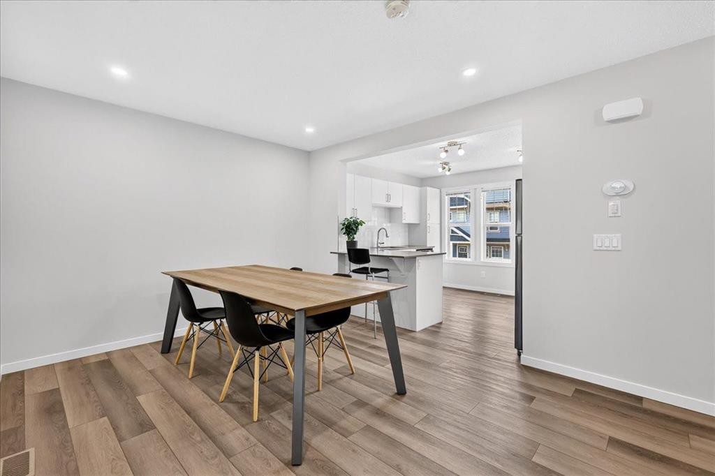 246 Cranbrook Square Se, Calgary, AB - Indoor Photo Showing Dining Room