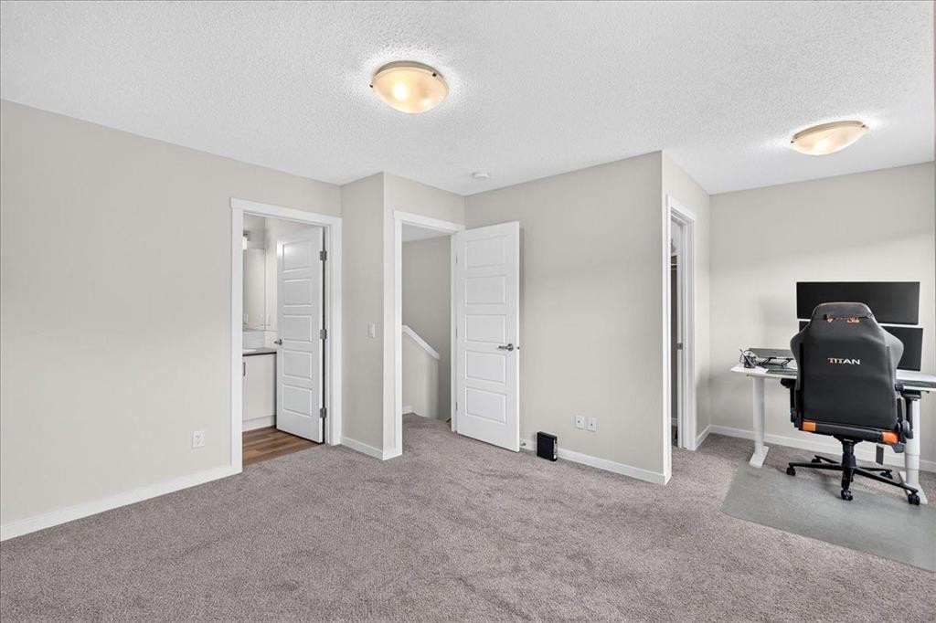 246 Cranbrook Square Se, Calgary, AB - Indoor Photo Showing Other Room