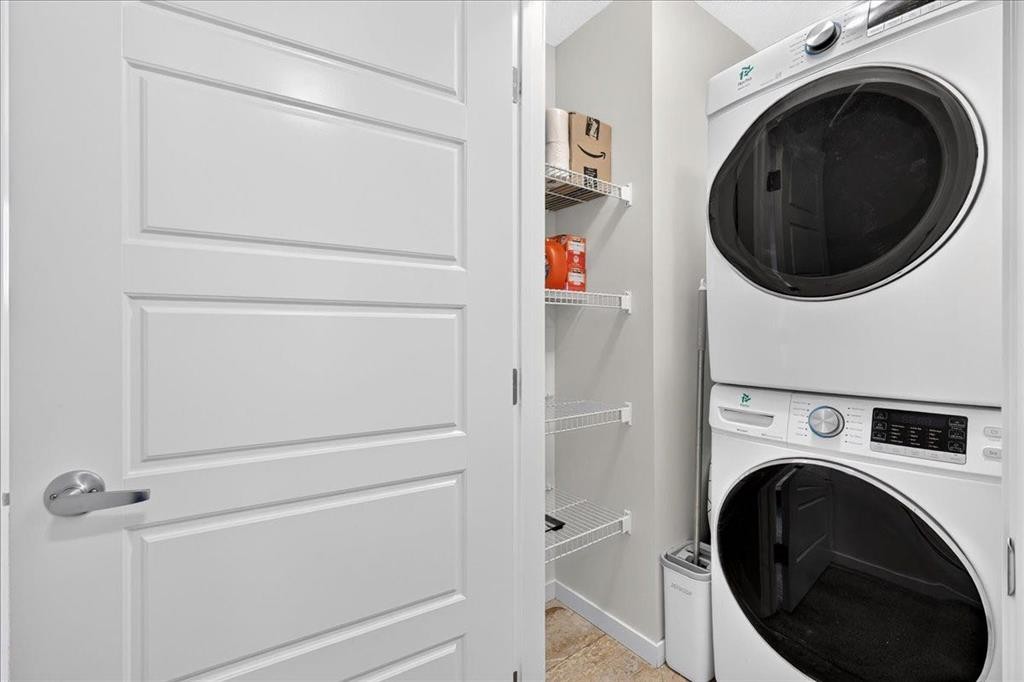 246 Cranbrook Square Se, Calgary, AB - Indoor Photo Showing Laundry Room