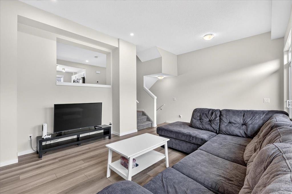 246 Cranbrook Square Se, Calgary, AB - Indoor Photo Showing Living Room