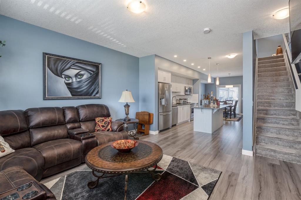 258 Copperleaf Way Se, Calgary, AB - Indoor Photo Showing Living Room