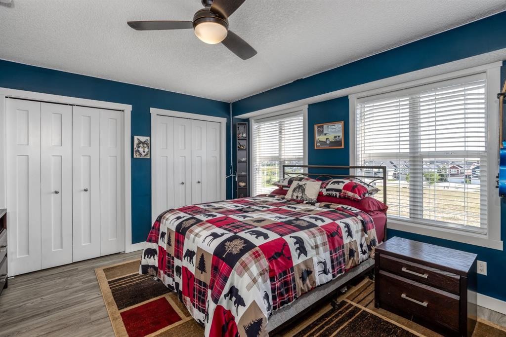 258 Copperleaf Way Se, Calgary, AB - Indoor Photo Showing Bedroom
