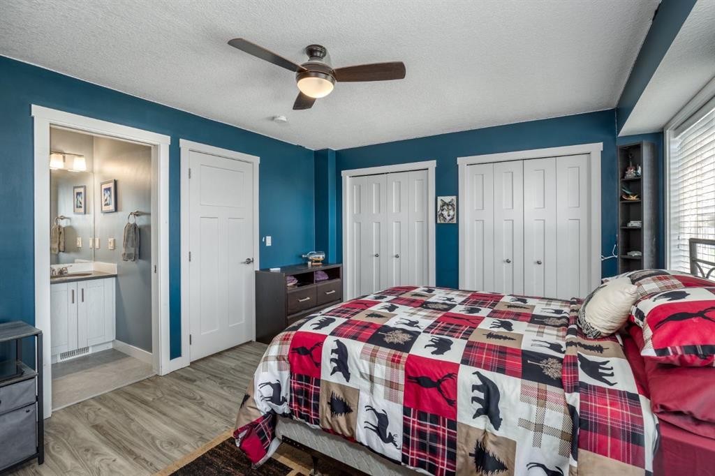 258 Copperleaf Way Se, Calgary, AB - Indoor Photo Showing Bedroom