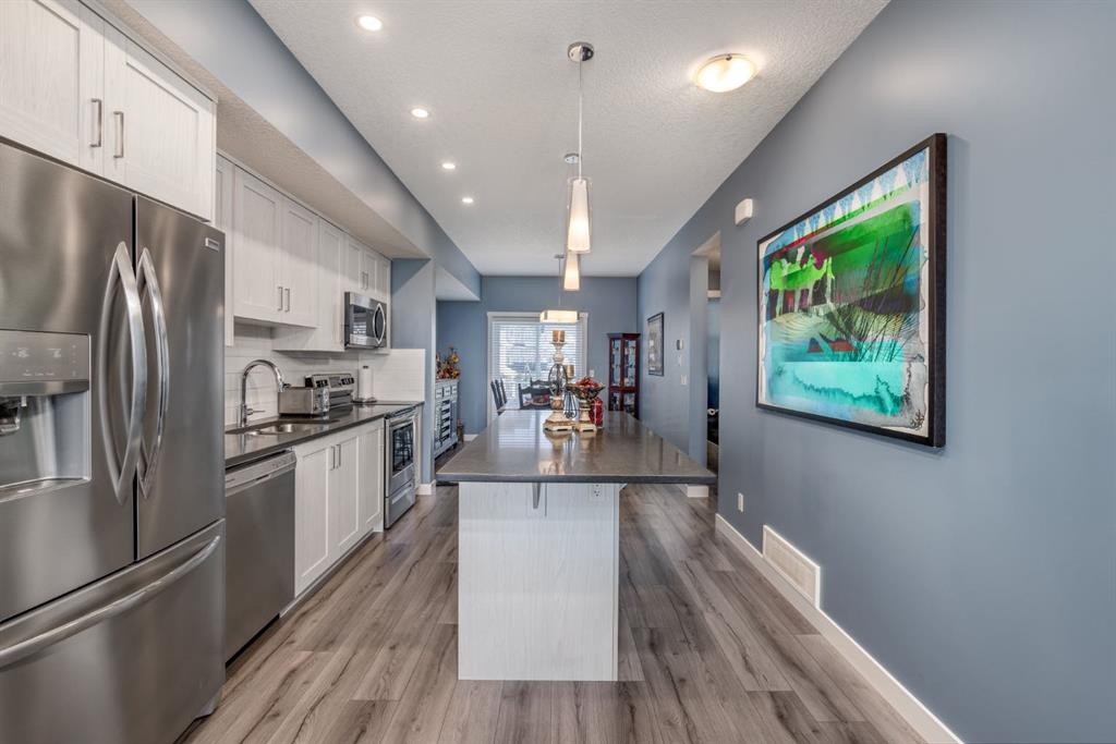 258 Copperleaf Way Se, Calgary, AB - Indoor Photo Showing Kitchen With Stainless Steel Kitchen With Upgraded Kitchen