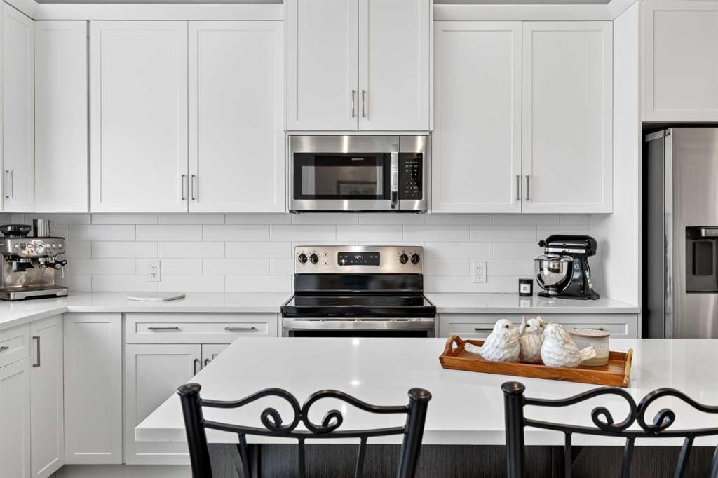 132 Creekside Drive Sw, Calgary, AB - Indoor Photo Showing Kitchen With Stainless Steel Kitchen With Upgraded Kitchen