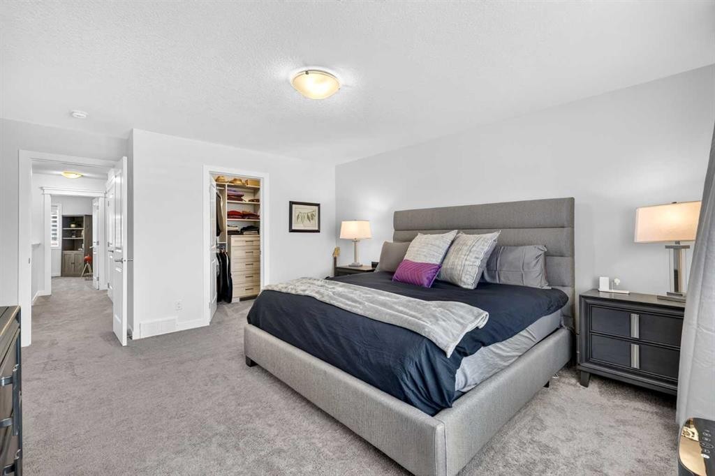 132 Creekside Drive Sw, Calgary, AB - Indoor Photo Showing Bedroom