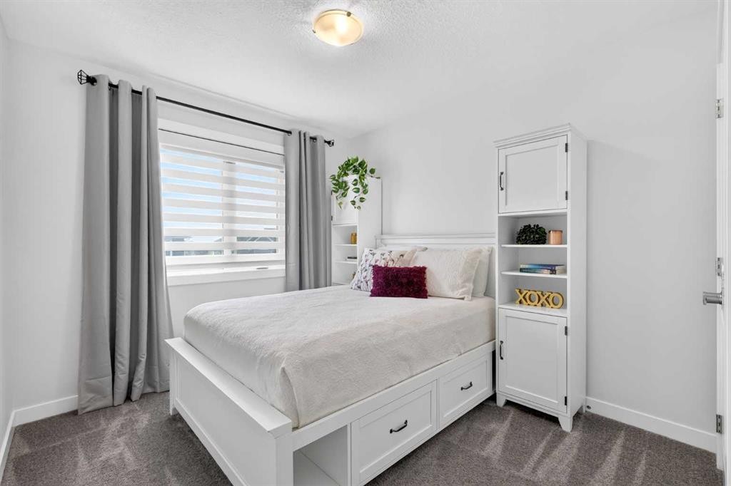 132 Creekside Drive Sw, Calgary, AB - Indoor Photo Showing Bedroom