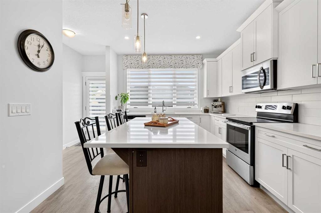 132 Creekside Drive Sw, Calgary, AB - Indoor Photo Showing Kitchen With Stainless Steel Kitchen With Upgraded Kitchen