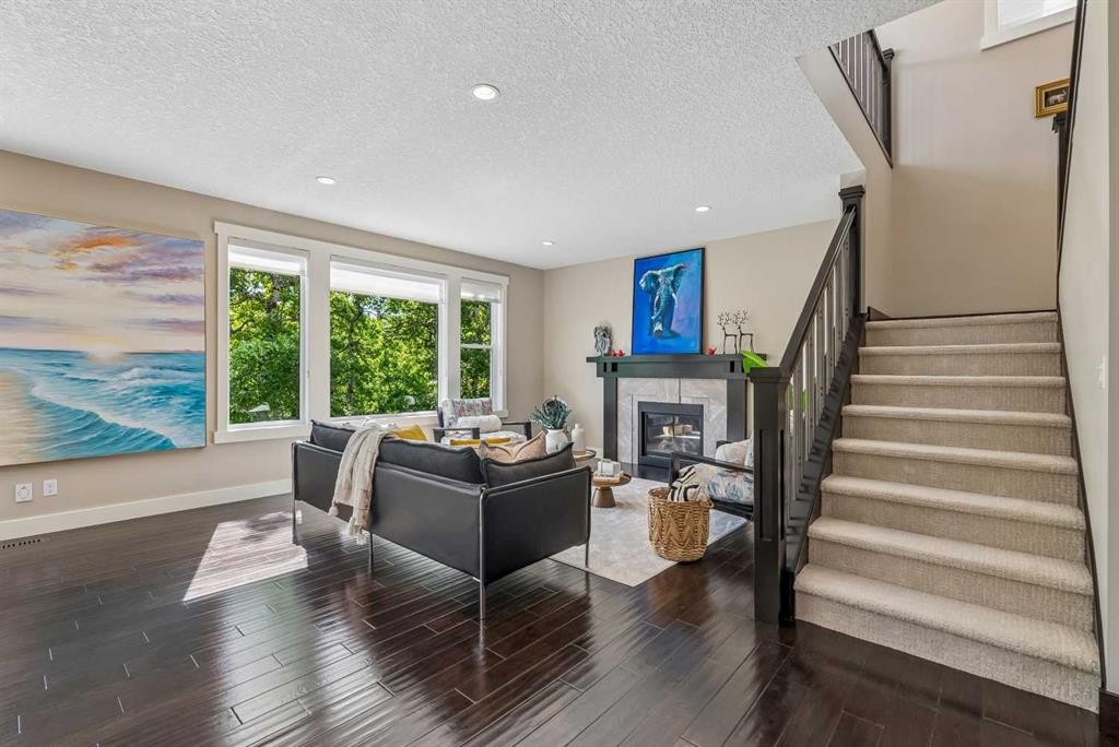 30 Ascot Crescent Sw, Calgary, AB - Indoor Photo Showing Other Room With Fireplace