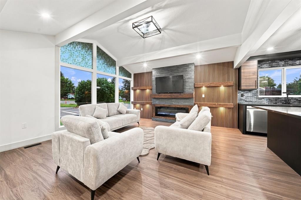 8304 11 Street Sw, Calgary, AB - Indoor Photo Showing Other Room With Fireplace