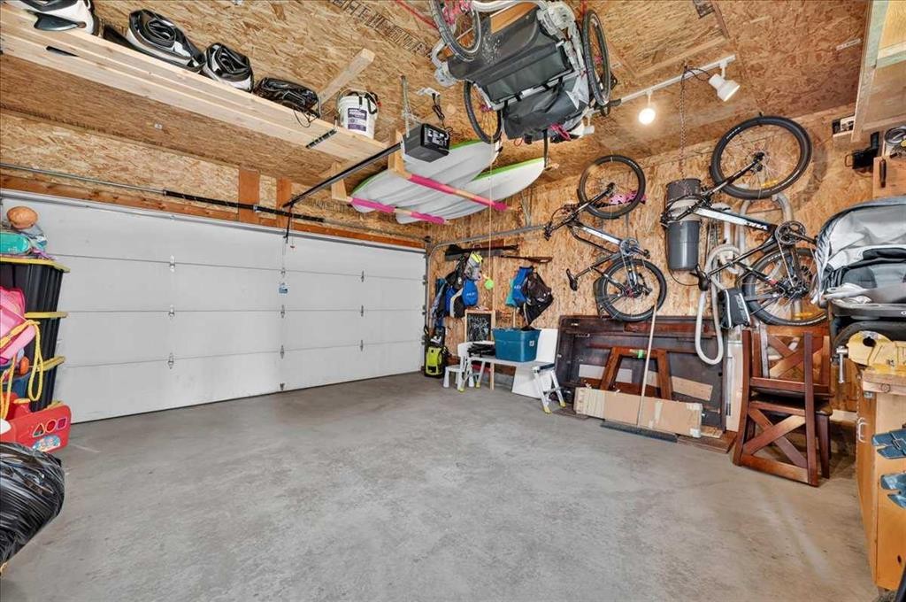95 Hidden Point Nw, Calgary, AB - Indoor Photo Showing Garage