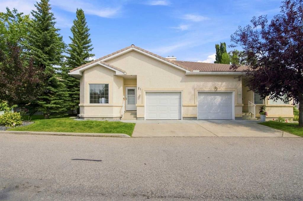 21 Scimitar Heath Nw, Calgary, AB - Outdoor With Facade