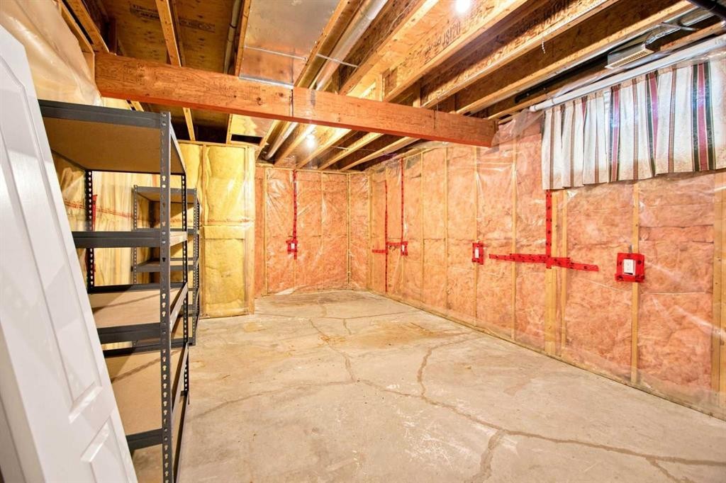 21 Scimitar Heath Nw, Calgary, AB - Indoor Photo Showing Basement