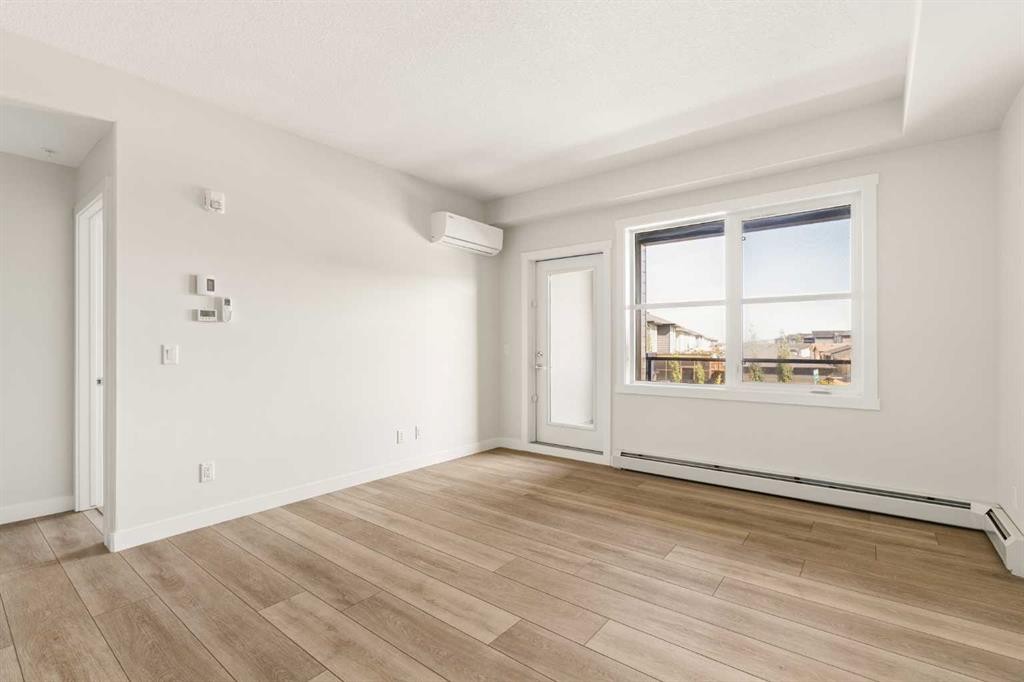 218-55 Wolf Hollow Crescent Se, Calgary, AB - Indoor Photo Showing Other Room