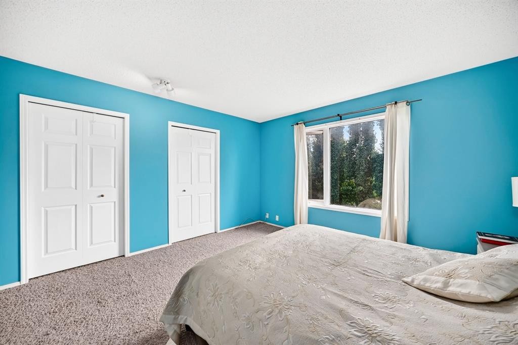 14954 Mt Mckenzie Drive Se, Calgary, AB - Indoor Photo Showing Bedroom